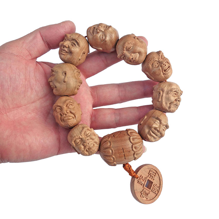 Peach wood carving double-sided eighteen arhats hand string Buddha statue Buddha beads Guan public relations second master hand-made wooden gear beads
