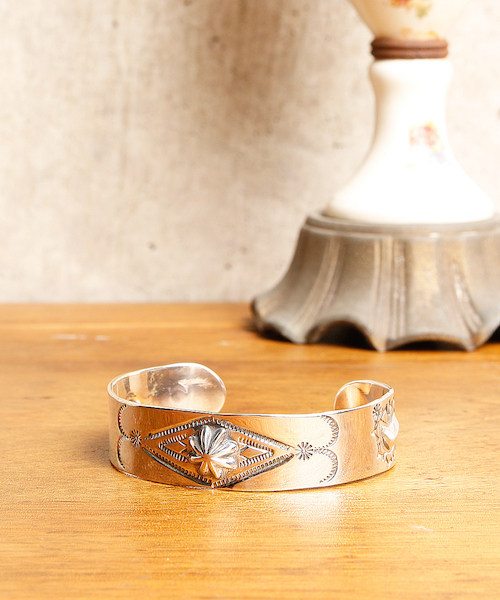 NORTH WORKS Japanese inaugural handmade Indian totem with smiley face and LOVE seal silver bay bracelet