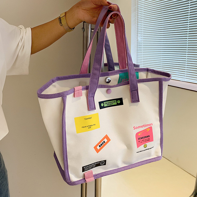 Mommy bag 2022 new large-capacity portable canvas bag to go out mother and baby storage treasure mother with baby go out bag