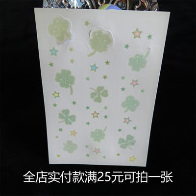 A four-leaf clover die-cut selfie is given as a gift