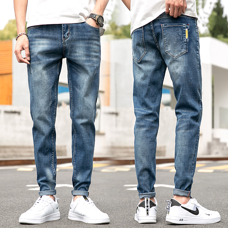 New jeans men's small foot trousers in autumn and winter shade of light blue hundred millions of elastic spring and autumn nine points