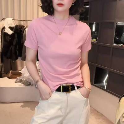 Spring's new round-neck, off-the-shoulder short-sleeved T-shirt is a fashionable and versatile choice for women. It can be paired with a slimming top and a casual base layer