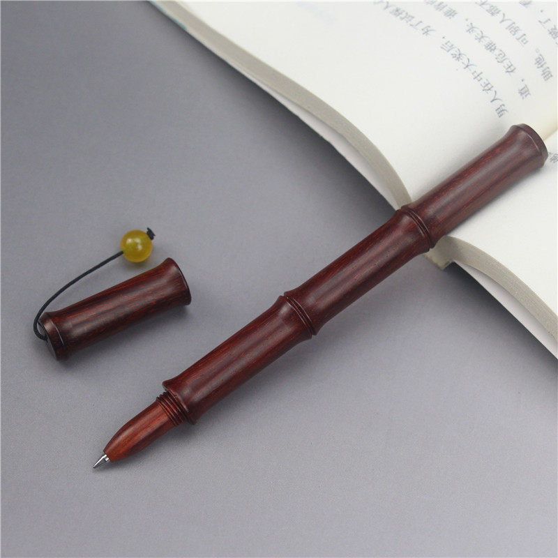 Yilianju lobular red sandalwood bamboo signature pen snake pattern solid wooden pearl pen writing book neutral pen gift customization