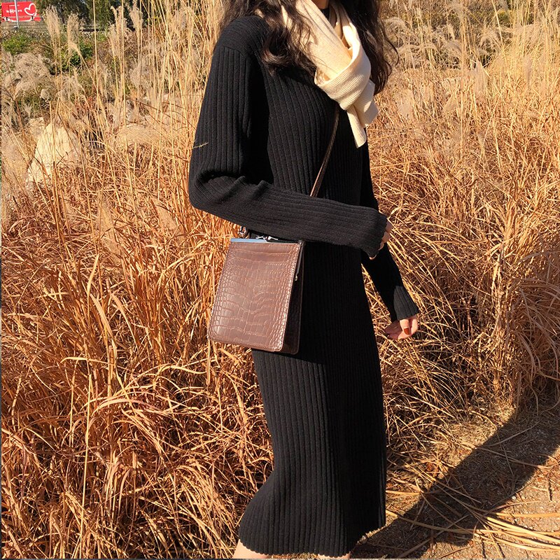 In autumn and winter, wear 2022 long version over the knee temperament and wear a dress inside