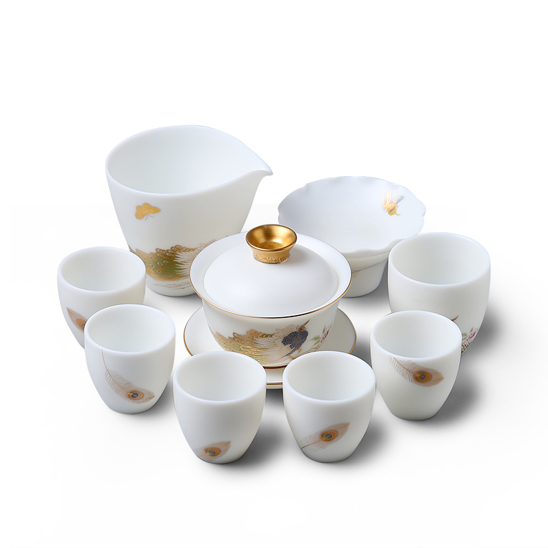 Dehua suet white porcelain clay seal kung fu tea set suit household peacock harmony of a complete set of gift box office to receive a visitor