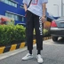 Quần yếm nam thương hiệu lỏng lẻo thẳng tắp đẹp trai t rộng chân bf gió treo chín điểm phiên bản tiếng Hàn của quần ulzzang Crop Jeans