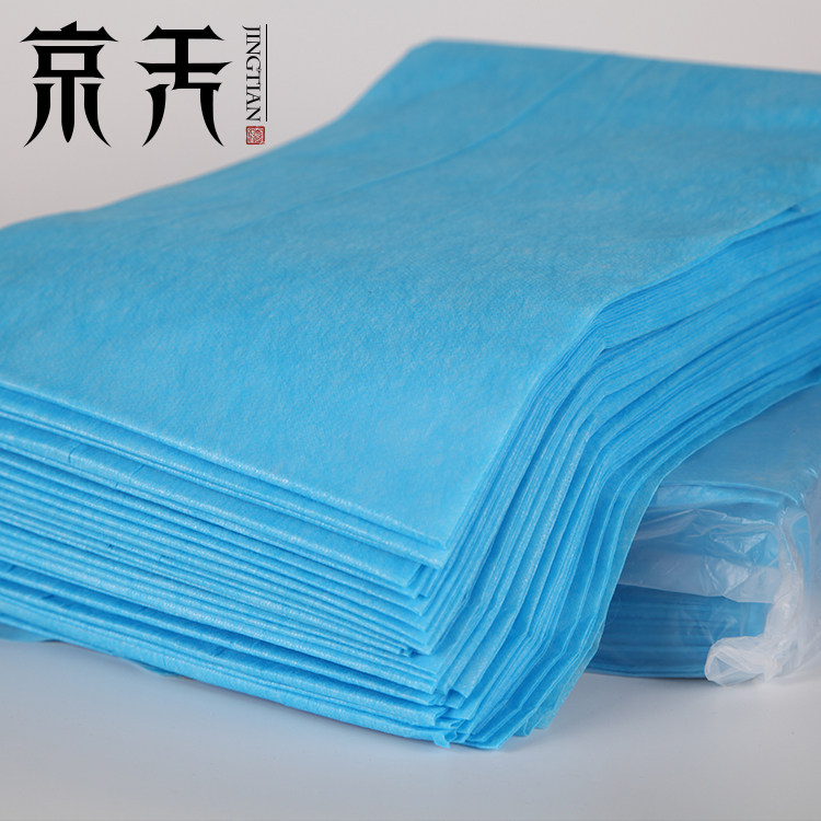 Thickened oil-proof and waterproof disposable bed sheet tattoo massage beauty bed with non-woven fabric film Jingtian tattoo franchise