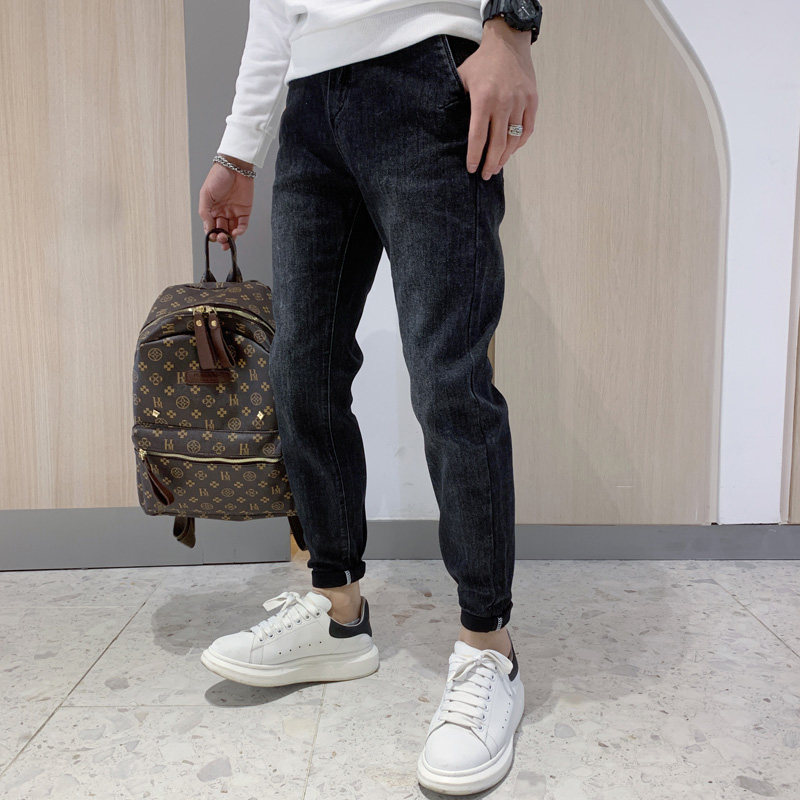 Black jeans men's trendy brand trend handsome wild men's pants autumn and winter 2020 new Korean version of small feet pants