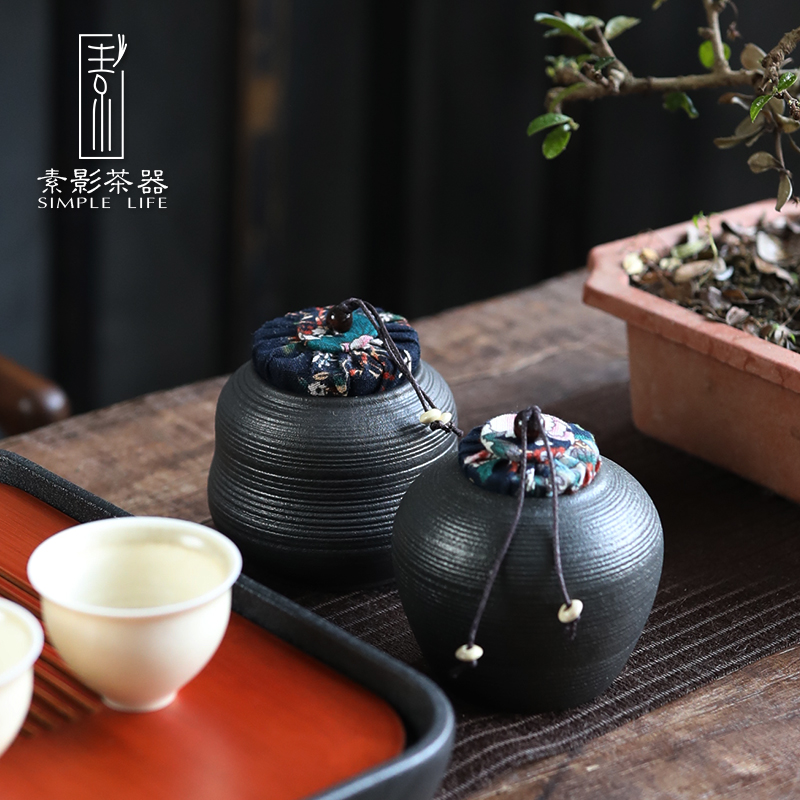 Plain film caddy fixings household ceramic POTS trumpet pu - erh tea boxes portable mini black tea with sealed as cans