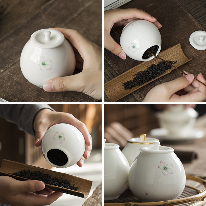 Plain film white porcelain small ceramic tea caddy fixings portable storage tanks miles peach blossom put with cover sealed container pot