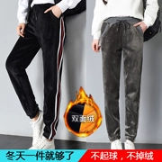 Quần nhung vàng nữ sinh cộng với quần nhung harem quần mùa thu đông màu đen mặc quần bó sát dày quần rộng