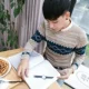 Áo len nam cổ cao phiên bản Hàn Quốc cá tính xu hướng mùa đông Nhật Bản áo len trùm đầu áo len thêu sinh viên