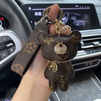 Берниловая кожаная веревка с пером.