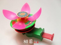 Small gift after 80 classic nostalgic hand push Lotus Flint glowing lotus toy childrens clockwork toy