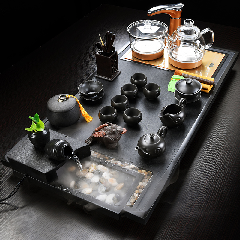 Are a popular tea tray of a complete set of tea sets electromagnetism automatic four unity sharply stone, ceramic household put modern living room