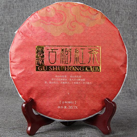 Yunnan Yunnan black tea large leaf species ancient tree sunburn black tea Yunnan Fengqing black tea flower aromas gansweet 357g round cake black tea
