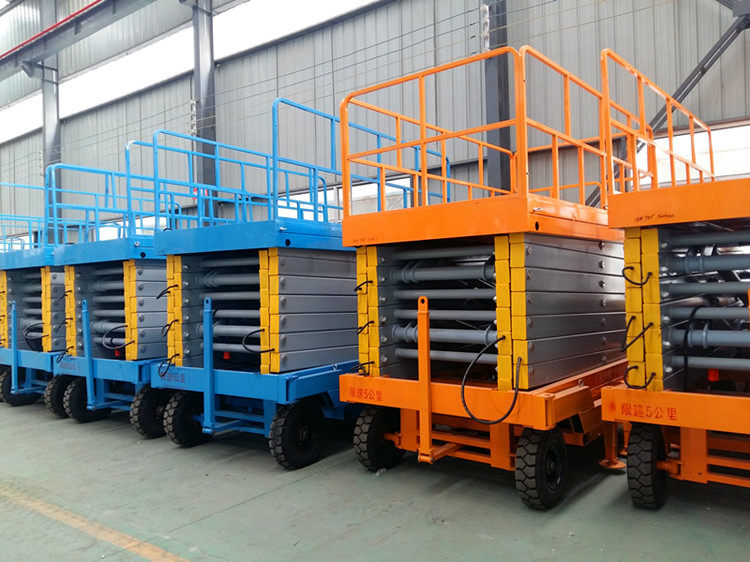 Electric hydraulic mobile fixed self-propelled battery auxiliary vehicle trailer high altitude operation platform