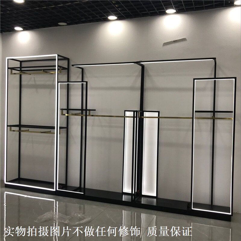 Clothing store shelves floorstanding display shelves with lights hanging hangers men's and women's clothing stores in the island cabinet hanging clothes rack wrought iron