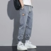 2022 mùa đông mới áo liền quần nam mùa xuân và mùa thu rời ấm nam trang denim quần âu quần jean nam Quần jean