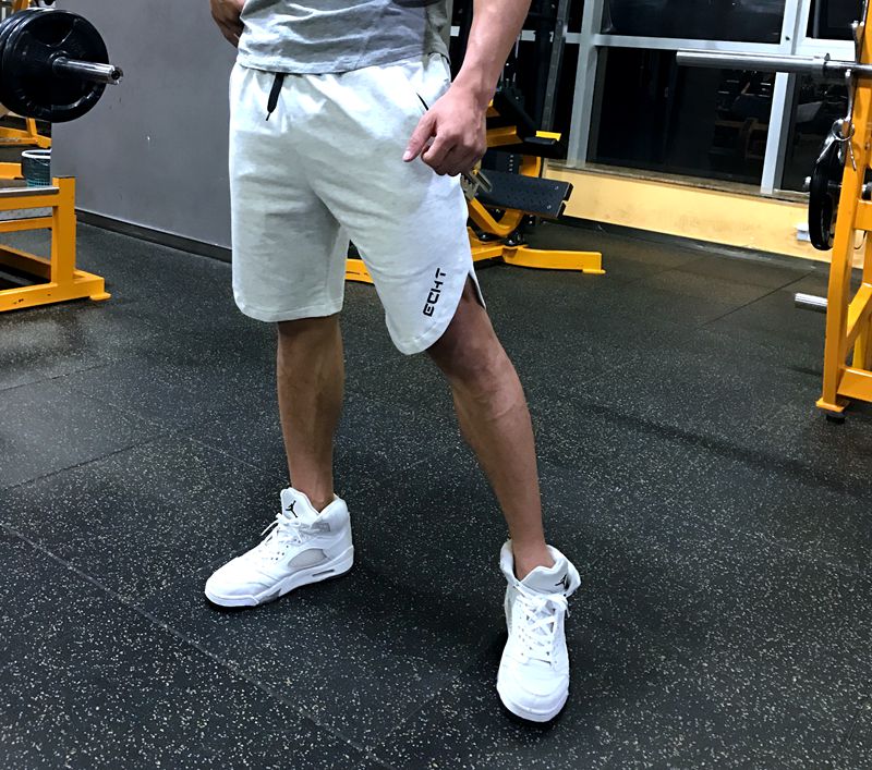 Quần short thể thao nam mùa hè lỏng thoáng khí năm quần cơ anh em tập thể dục chạy quần mỏng phần cotton quần thường - Quần thể thao quần cầu lông yonex