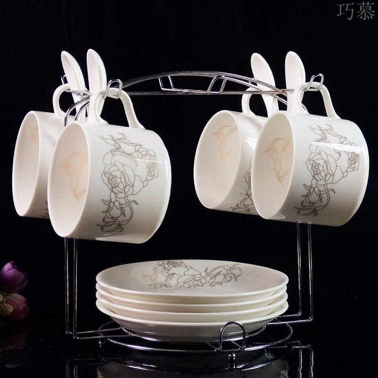 Qiao mu European ceramic coffee cup sets of high - grade up phnom penh creative four - piece spoon with ipads China coffee cups and saucers