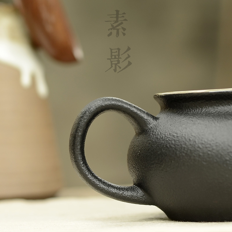 Qiao mu coarse pottery glaze stone fair keller of black points by hand and a cup of black zen tea cups