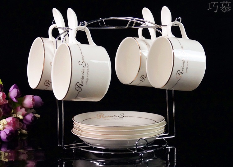 Qiao mu European ceramic coffee cup sets of high - grade up phnom penh creative four - piece spoon with ipads China coffee cups and saucers