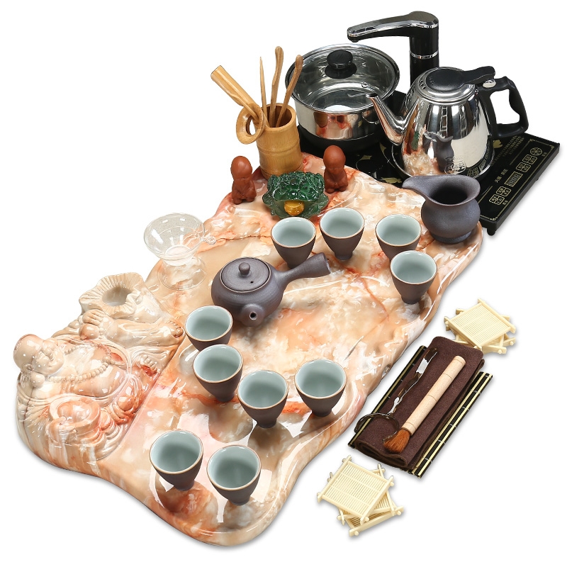 Qiao mu water stone tea set purple ice crack of a complete set of kung fu tea tea tea tray was four unity of electric heating furnace