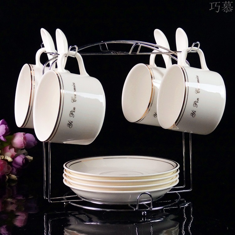 Qiao mu European ceramic coffee cup sets of high - grade up phnom penh creative four - piece spoon with ipads China coffee cups and saucers
