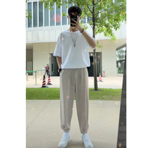 Clean boys wear a handsome set of handsome wearing Harbor wind loose printed short sleeve T-shirt with ice wire nine pants in summer