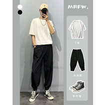 Clean boy wearing summer pure color and loose cotton short sleeve T-shirt with hanging ice-screen pants