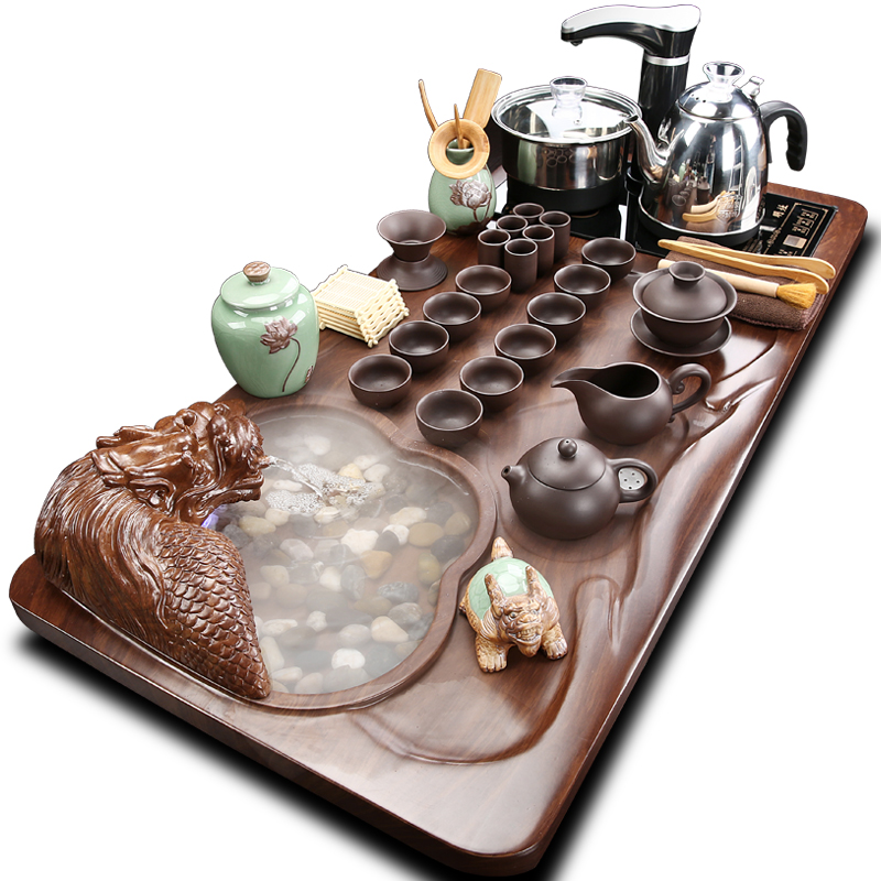 A complete set of kung fu tea set household automatic integrated solid wood tea tray was sitting room tea tea sea tea cups