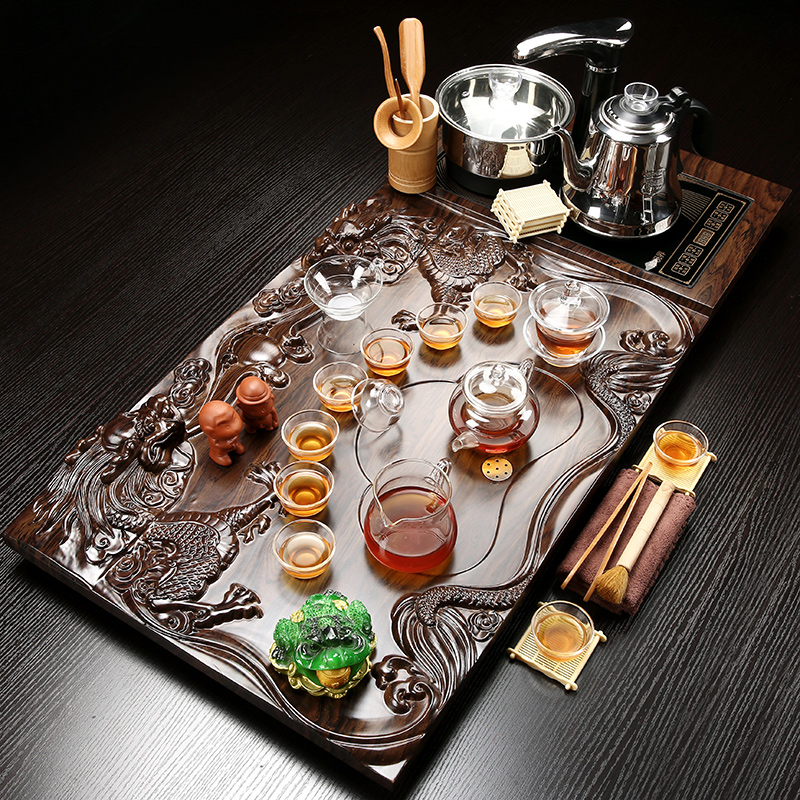 Sand embellish tea set suit household contracted automatic violet arenaceous kung fu of a complete set of the joining together of four solid wood tea tray, tea tea taking