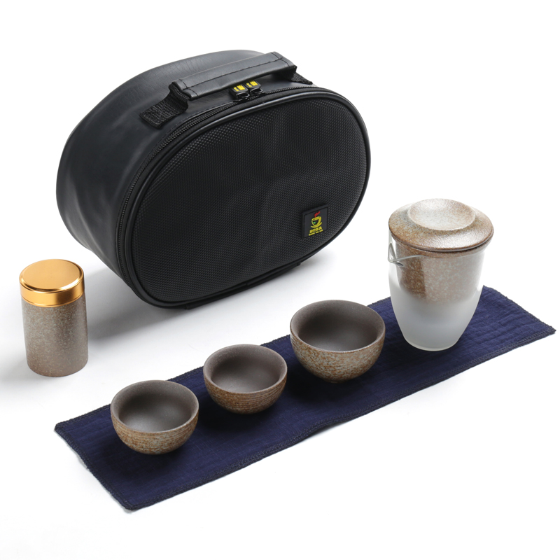 Portable travel tea set with four cups ceramic kung fu tea tray was Portable travel package a pot of tea set a small set of custom