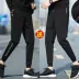 Mùa thu và mùa đông học sinh trung học thể thao cộng với quần nhung trẻ trung Phiên bản Hàn Quốc của quần bảo vệ chân dầm mỏng Quần dài in chân quần jeans nam Quần tây thường