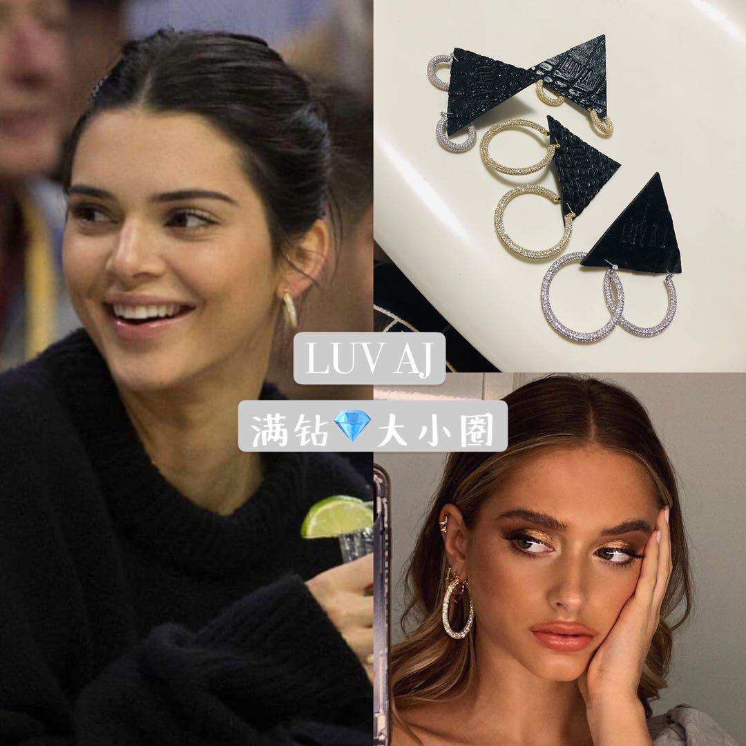 Spot USA overflash Luv Aj stars with the same shiny diamond earrings Kian beans Beyoncess Dear