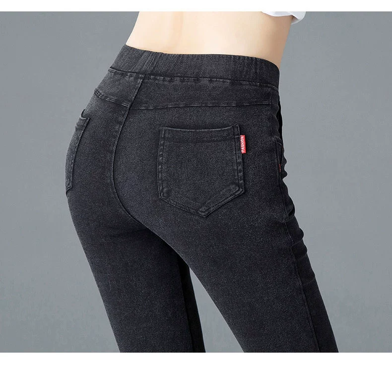 Cộng với quần nhung nữ màu đen 200 cân giả quần legging denim size lớn chất béo mm mặc eo cao mùa thu và mùa đông dày lên quan dai nu