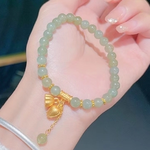周大生足金好柿莲莲和田玉手链