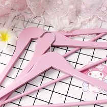 Pink and tender solid wood hangers Wood clothing stores clothing stowage clothes racks