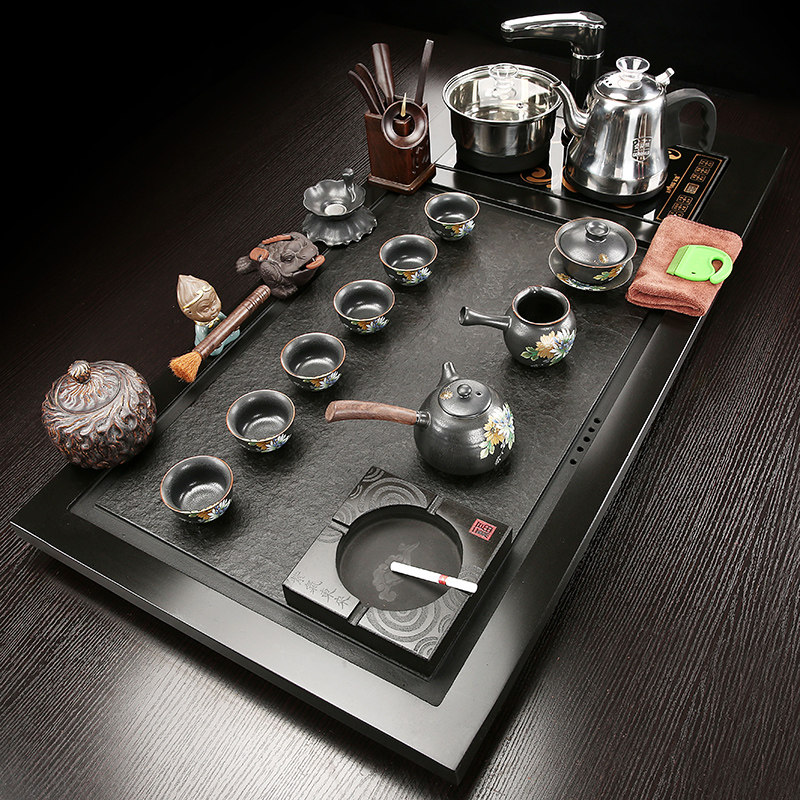 The whole piece of Uzuji tea plate automatically integrated ceramic purple sand kung fu tea set household tea table tea sea