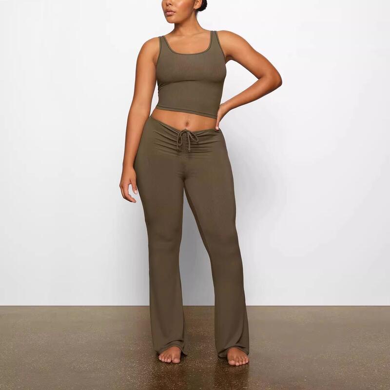 Skims Kardashian In-Stock Solid Color Modal Ribbed Elastic Front Pleated Slim-Fit Flared Pants