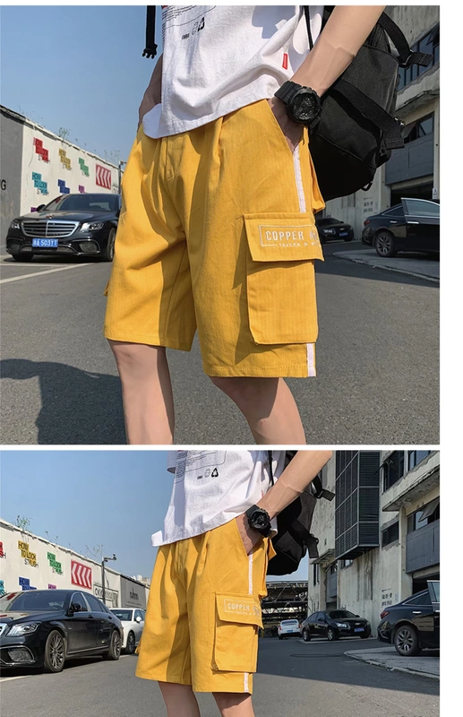 Quần short nam 2020 mới hè lỏng lẻo quần thể thao 5 điểm thương hiệu quần yếm thông thường áo liền quần phiên bản Hàn Quốc của thủy triều hoang dã - Quần làm việc