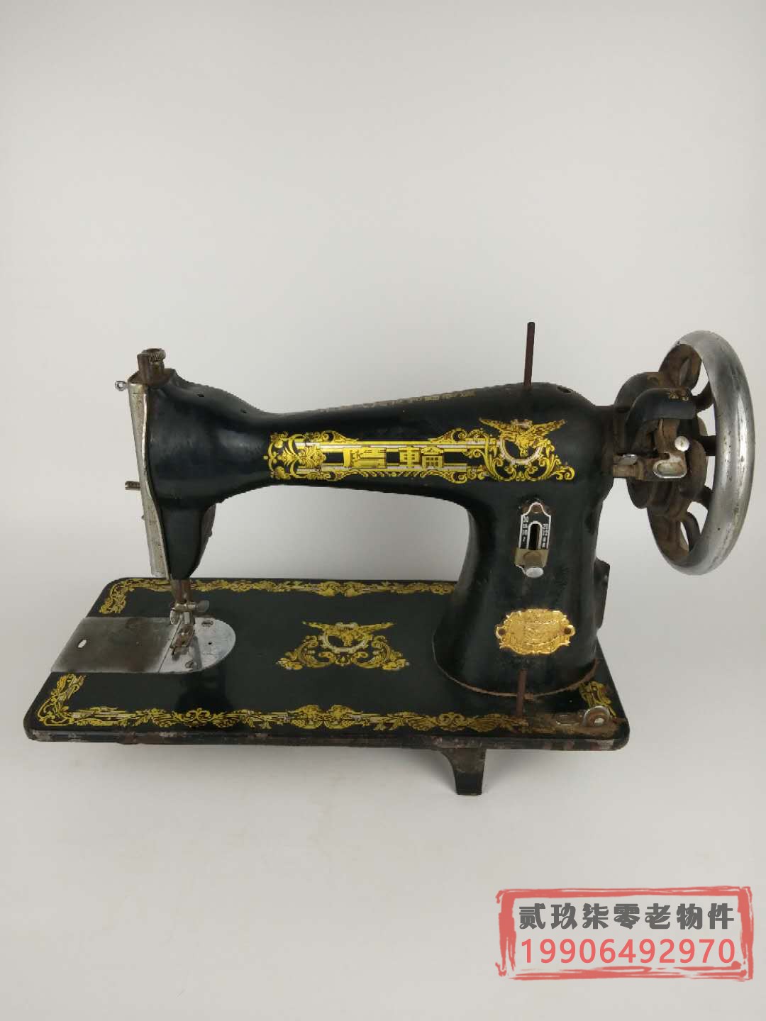 Old-style sewing machine header used machine window movie props nostalgia old objects antique collection