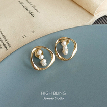 Original natural pearl winding Mobius ring earrings stud earrings Female silver needle no ear hole Mosquito coil disc ear clip painless