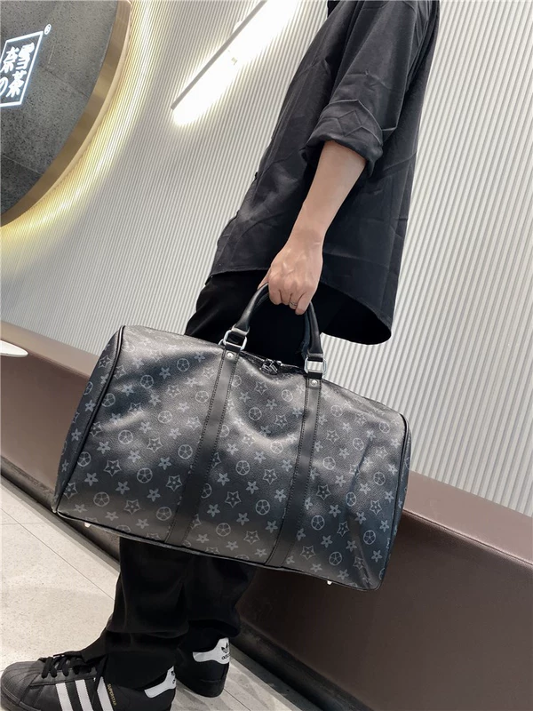 Hồng Kông mua túi du lịch bằng da của nam giới có dung lượng lớn đi công tác ngắn hạn du lịch túi hành lý xách tay nữ thể dục - Túi du lịch