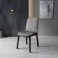 Цельное кресло из черной темно-серой кожи