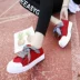 Mùa hè 2018 phiên bản Hàn Quốc mới của ren hoang dã sinh viên đại học gió trắng giày trắng ruy băng giày vải nữ giày sneaker nữ hot trend 2021 Plimsolls