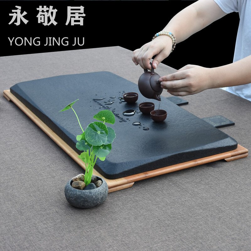 Yongjing residence natural Ujiuji tea plate household whole size small hand-made black stone drainage tea table
