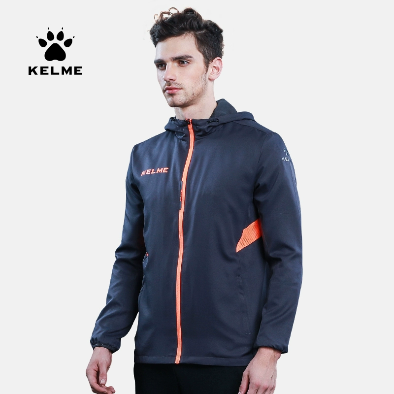 Áo khoác dệt KELME mới chống thấm nước chống thấm nước mặc thể thao áo gió nam mùa thu và mùa đông mô hình bóng đá trùm đầu đào tạo - Áo gió thể thao