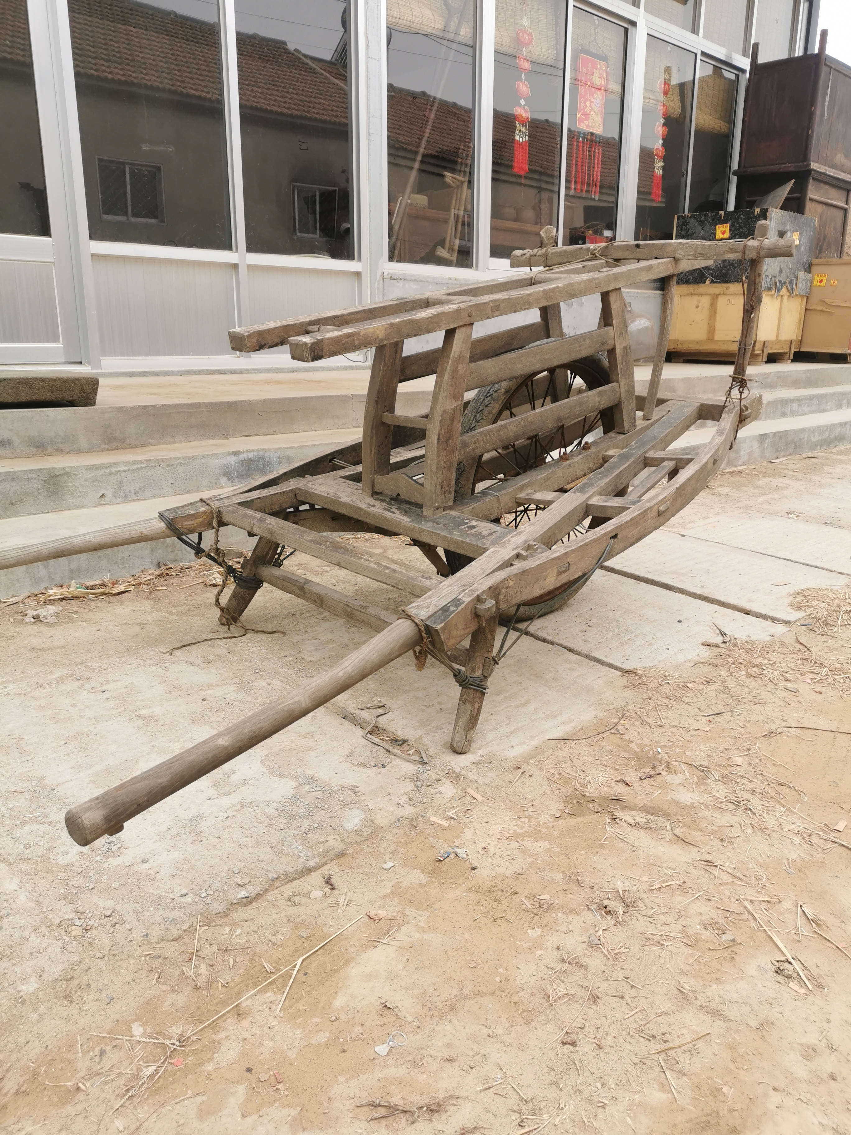 Old-style trolley folk old objects nostalgia old wood caravan old wood cart farmhouse with old wood truck farmhouse swing piece 